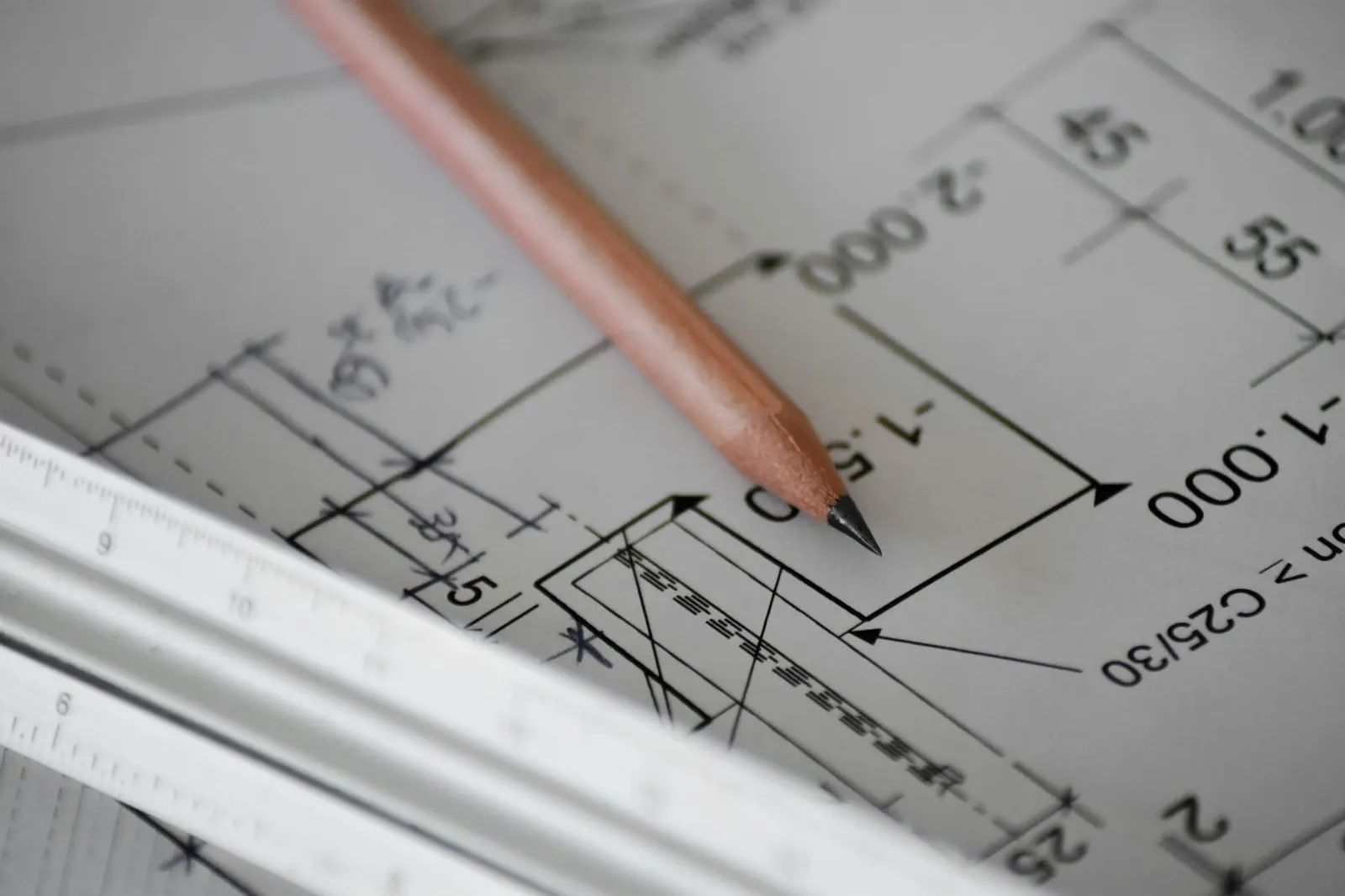 Pencil on a technical plan with dimensions